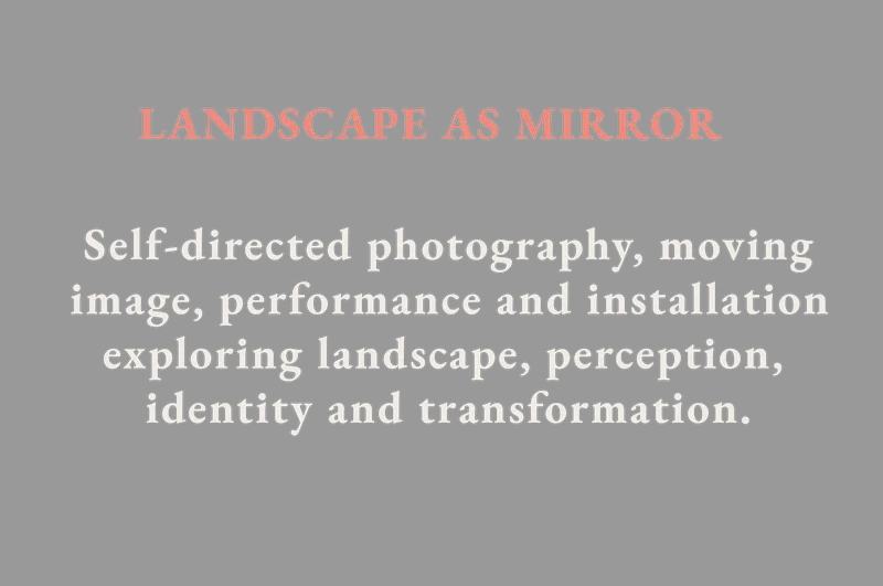 Explore Landscape as Mirror: a woman in a pale dress stands among fallen woodland branches, introducing self-directed photography, moving image, performance and installation.