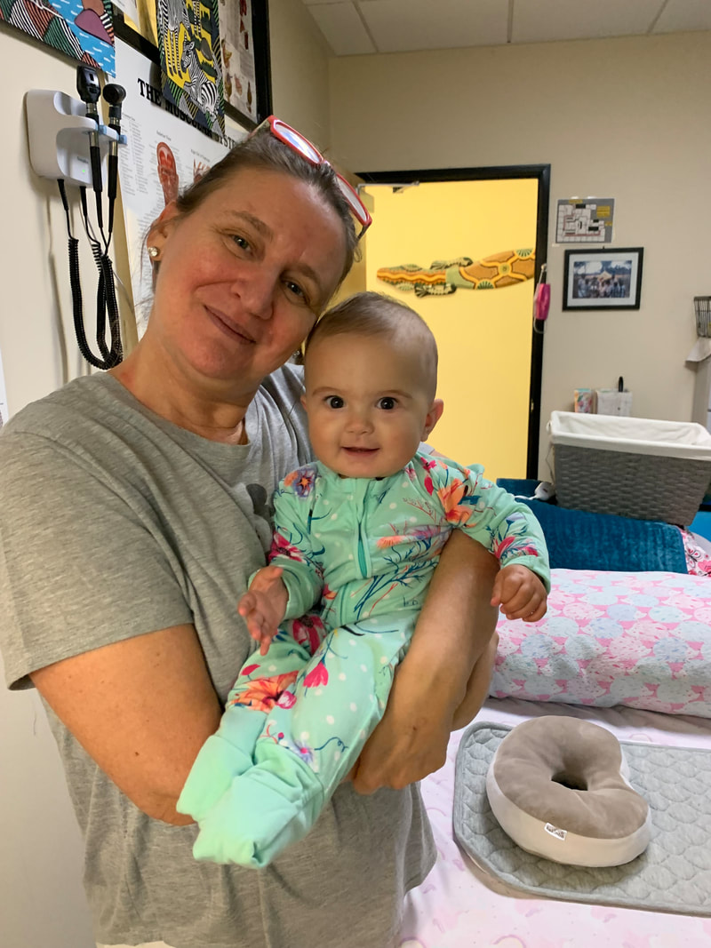DeeDee Hoover, LMT, CCT, PMT -- wellness coach, massage therapist, and parent advocate