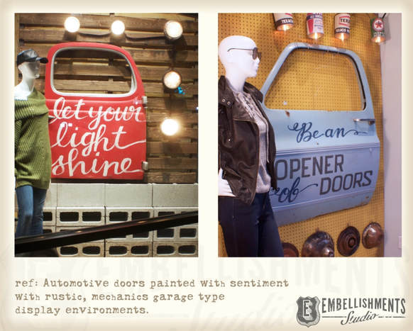 Painted car doors with handlettered quotes.