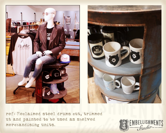 Old barrels were cut open, shelves were added and the exterior faux painted to look old yet colorful.
