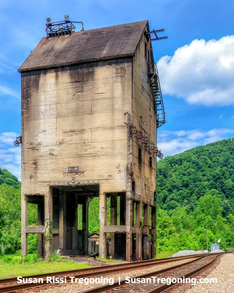 The 1922 reinforced‑concrete Coaling Tower in Thurmond, West Virginia, a tall rectangular structure rising about 70 feet above the railroad tracks, standing as one of the prominent remnants of the historic rail yard.