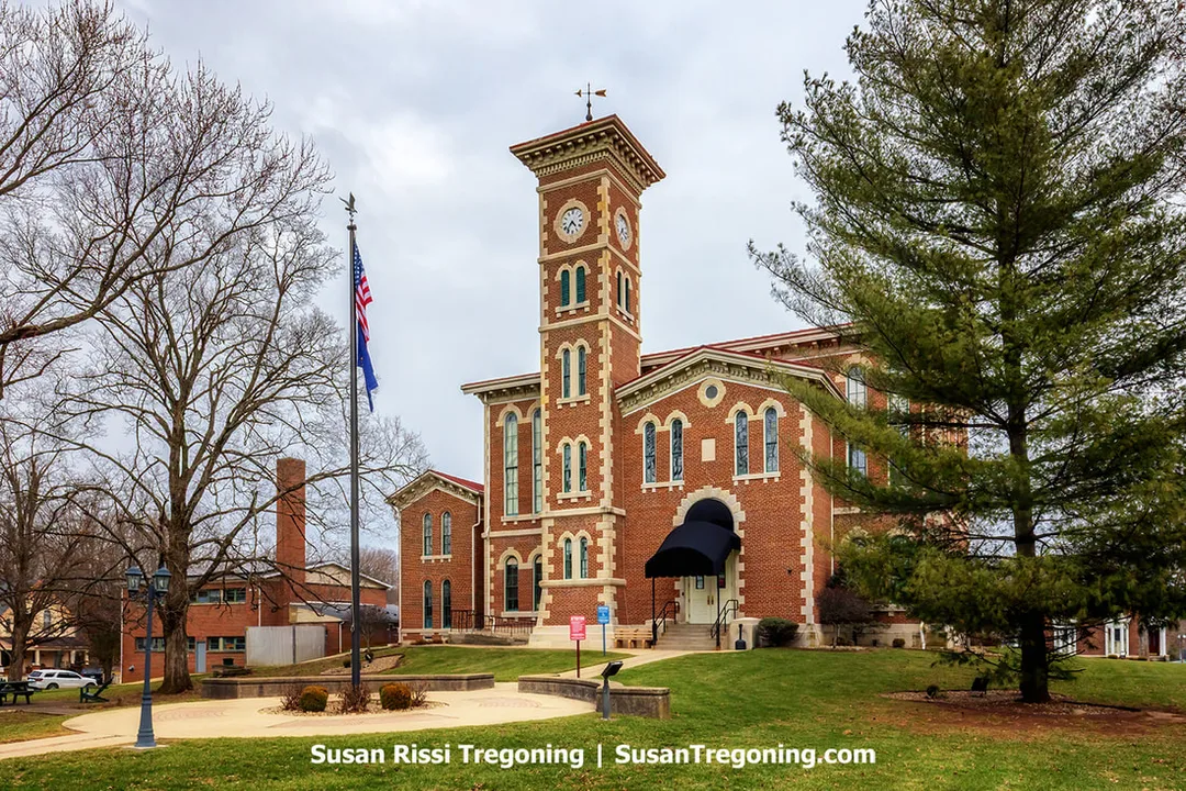Historic Jennings County Courthouse in Vernon, Indiana, shown from the front with its clock tower rising above the square.