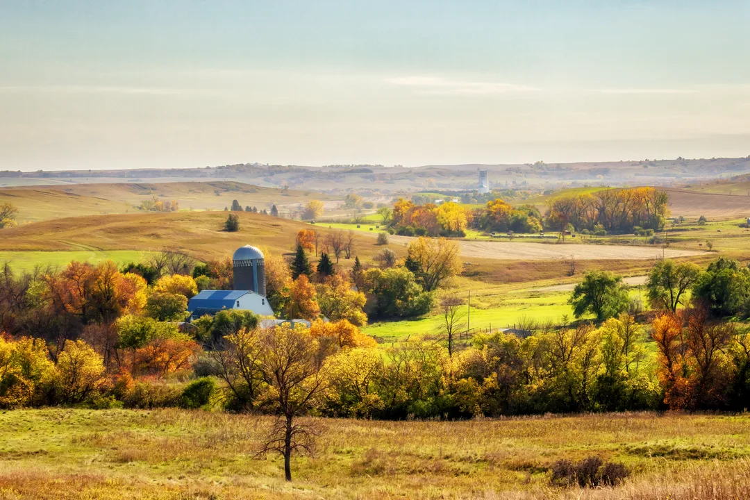 Autumn colors blanket the rolling hills of the Sheyenne River Valley near Kathryn, where farms and fields reflect the region's agricultural heritage.