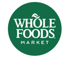 Green circular “Whole Foods Market” logo with white text and leaf in the letter “O”.