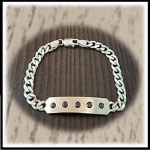 Main page item image Silver & Garnet Bracelet $600C