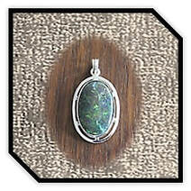Main page item silver & large oval solid opal matrix pendant $400D