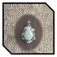 Main page item fancy silver frame & pear-shaped solid opal pendant $400L