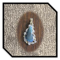 Main page item 18ct yellow gold diamond free-form solid black opal pendant $5800E 