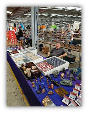 This is Fred at the market stall waiting to serve the next customer.