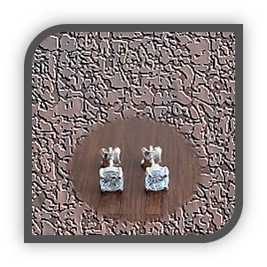 ES00150I-Sterling Silver Blue Zircon Studs.