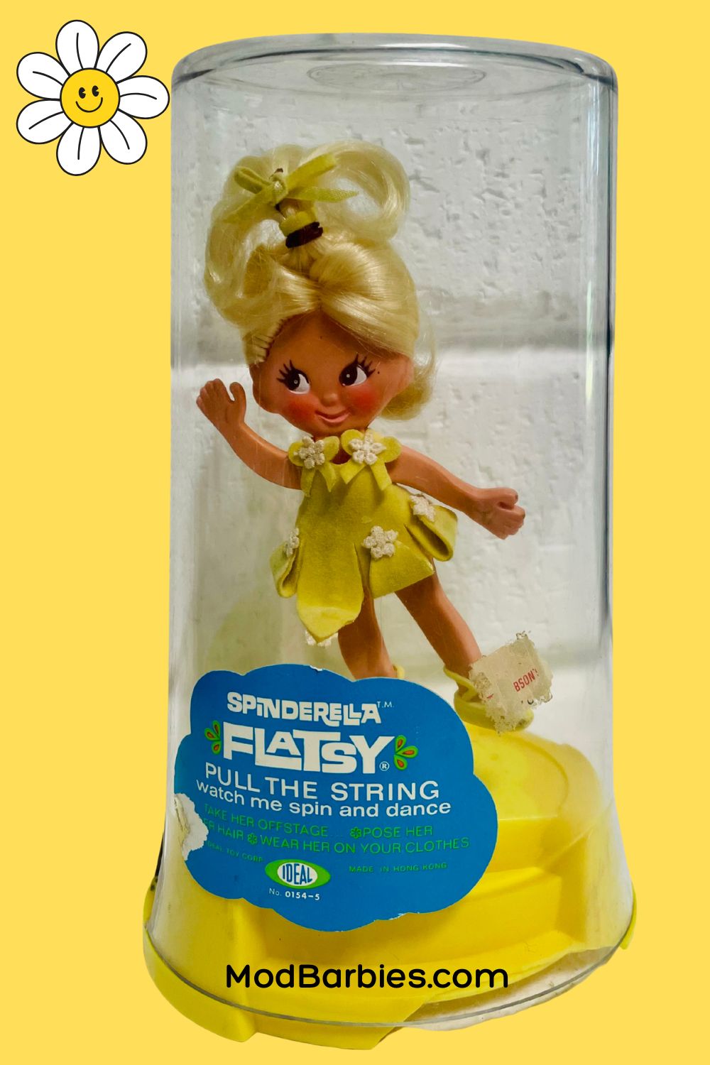 Spinderella Flatsy; you pulled a string and she would spin! She was available in pink, blue, green and yellow.