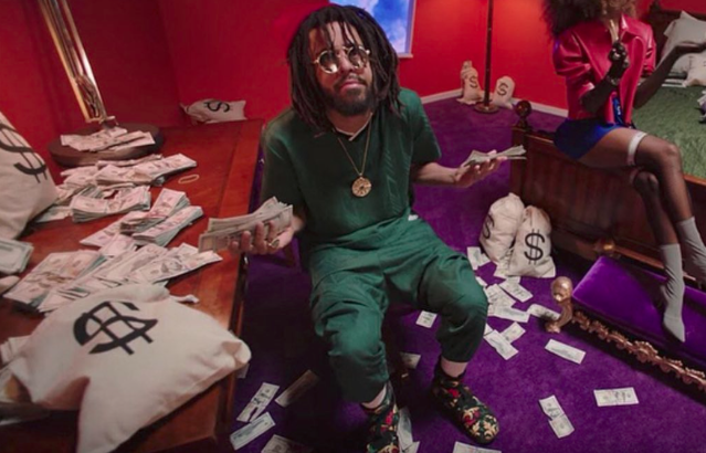 Watch J. Cole's music video for 'ATM' - his album out now!