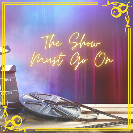 in the background, a dark purple stage curtain with hazer. in the foreground, a film clapperboard and film reel on a wooden table. a yellow boarder. yellow neon text: the show must go on