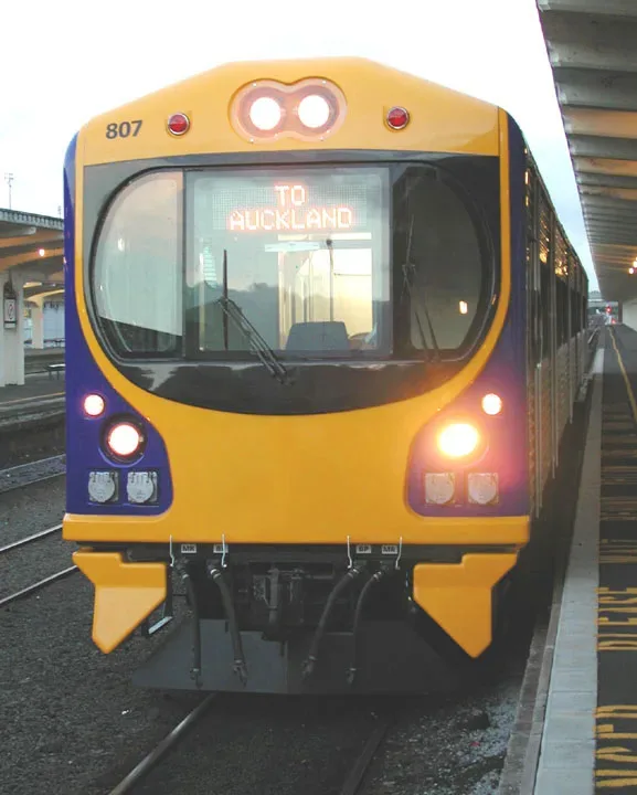 Yellow-and-blue passenger train with an FDL-manufactured fibreglass nose cone and cowcatchers