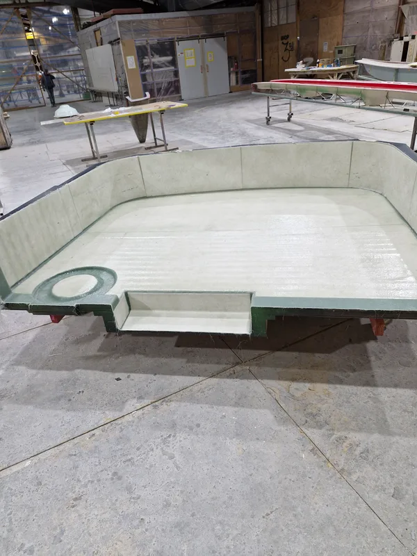 Fibreglass caravan side panel in a mould during manufacture