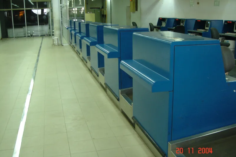 Completed row of blue airport check-in counters