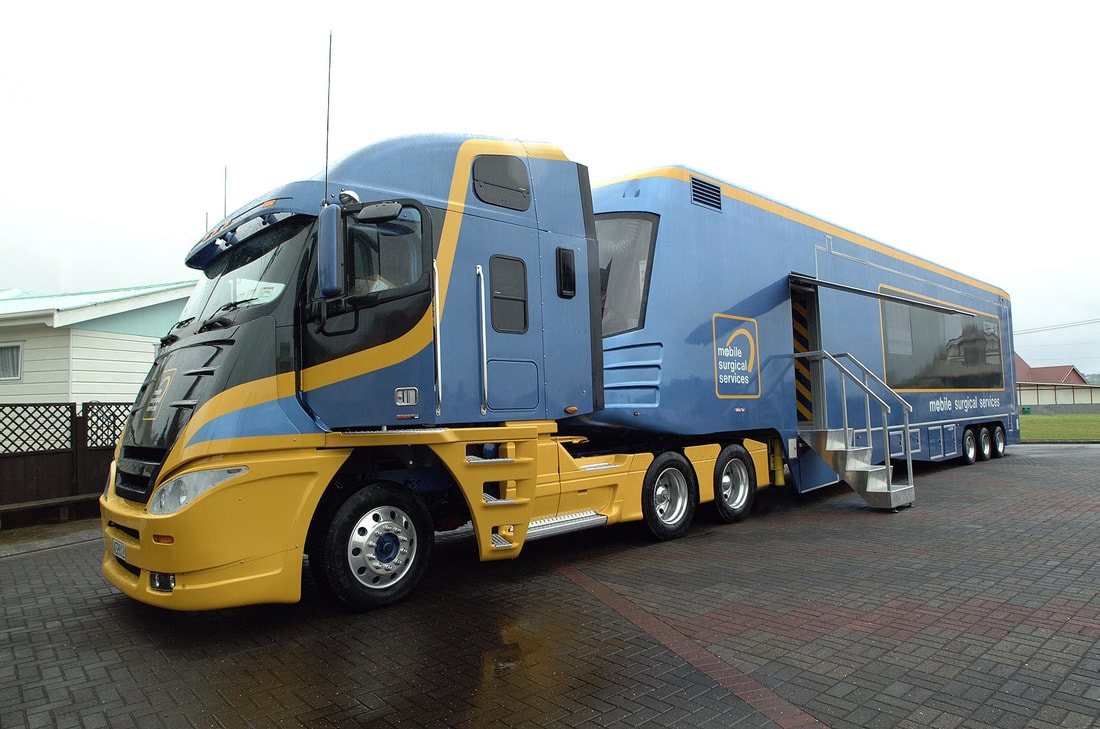 Mobile operating theatre with a fibreglass truck front and lightweight GRP trailer panels