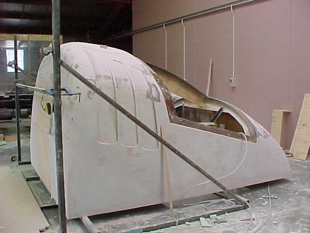 Moulded fibreglass trailer front during manufacture