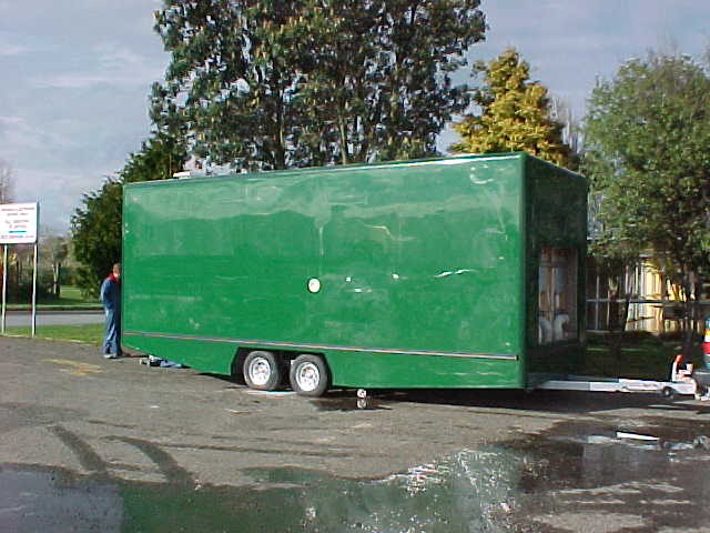 Side view of the completed tandem-axle Super Loo trailer