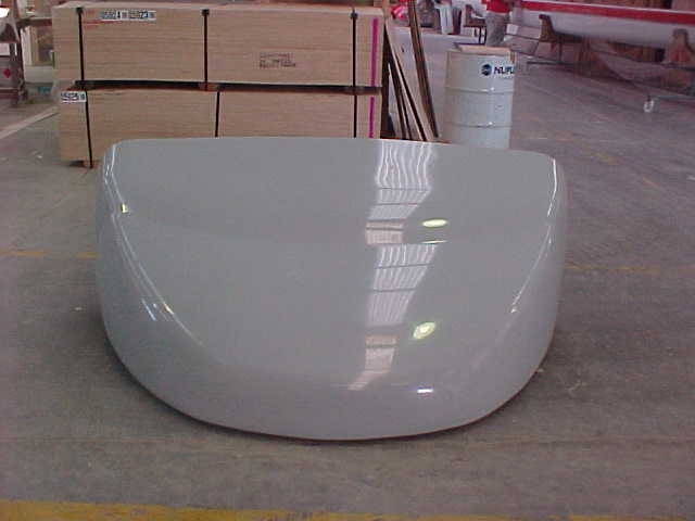 Front view of a white fibreglass Breeze Busta wind deflector