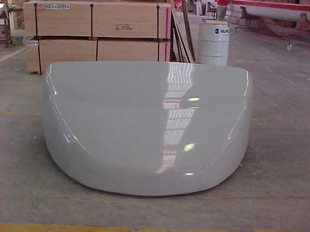 Front view of a white fibreglass Breeze Busta wind deflector