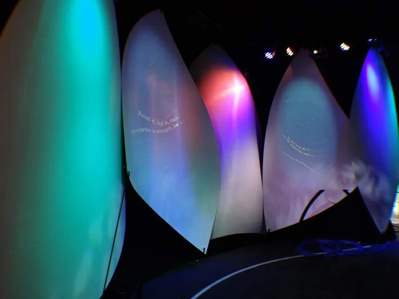 Close-up of illuminated moulded sail forms inside the Plastic Waka
