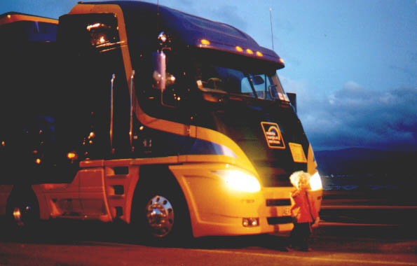 Mobile surgery unit photographed at night with its headlights on