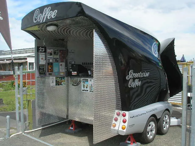 Black Streetwise Coffee promotional trailer with its service hatch open