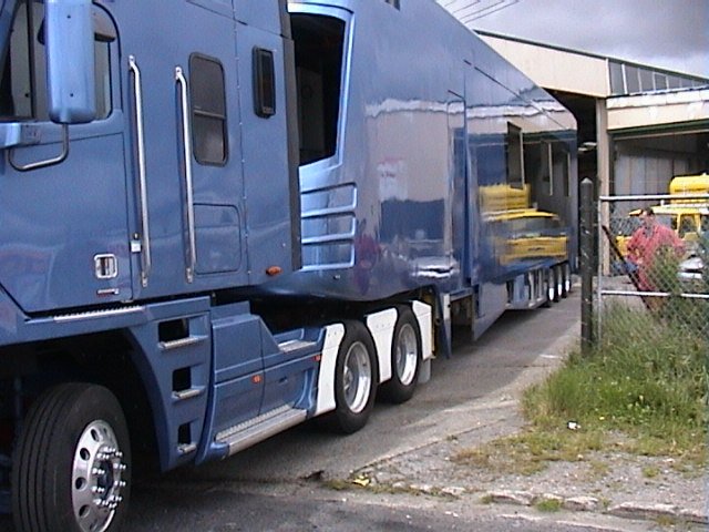 Mobile surgery truck and trailer unit viewed from the side before yellow detailing was added