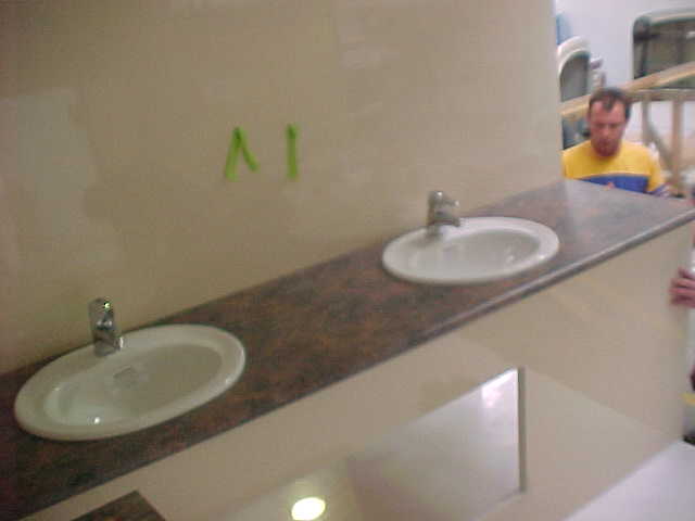 Twin hand basins fitted into the Super Loo vanity