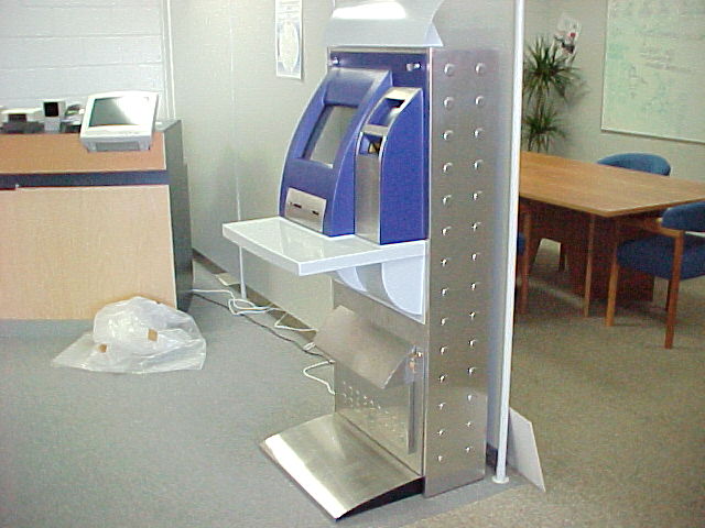 Payment kiosk installed beside a retail counter