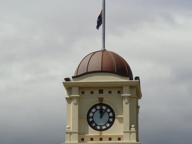 Alt text: Feilding Clock Tower with a fibreglass dome finished in copper-filled gelcoat