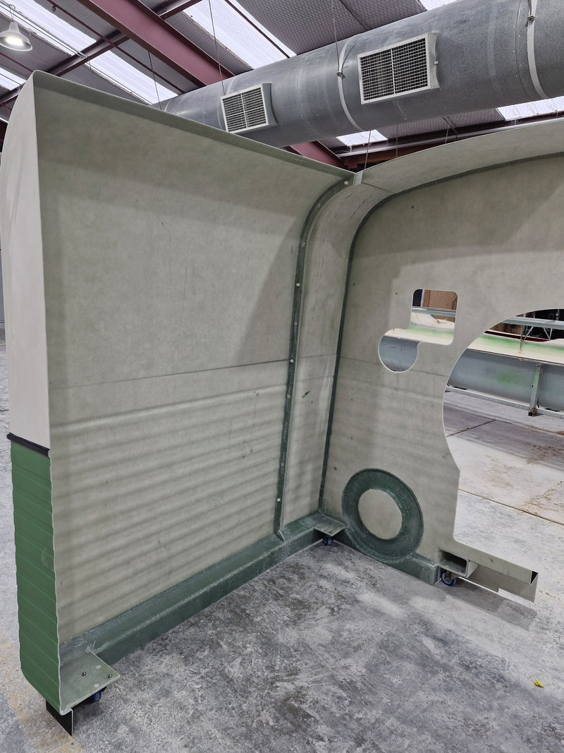 Interior of the fibreglass MRI caravan shell during manufacture