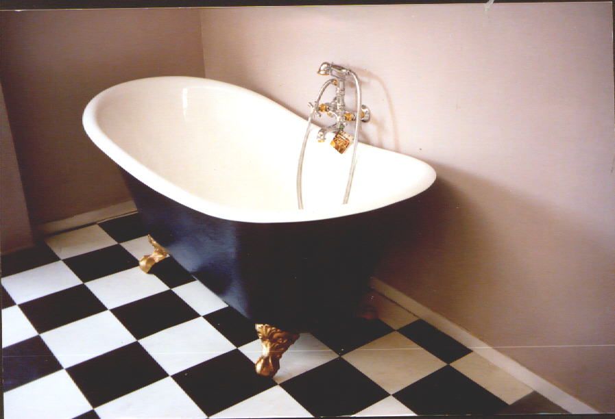 Black and white Super French composite bath with brass feet