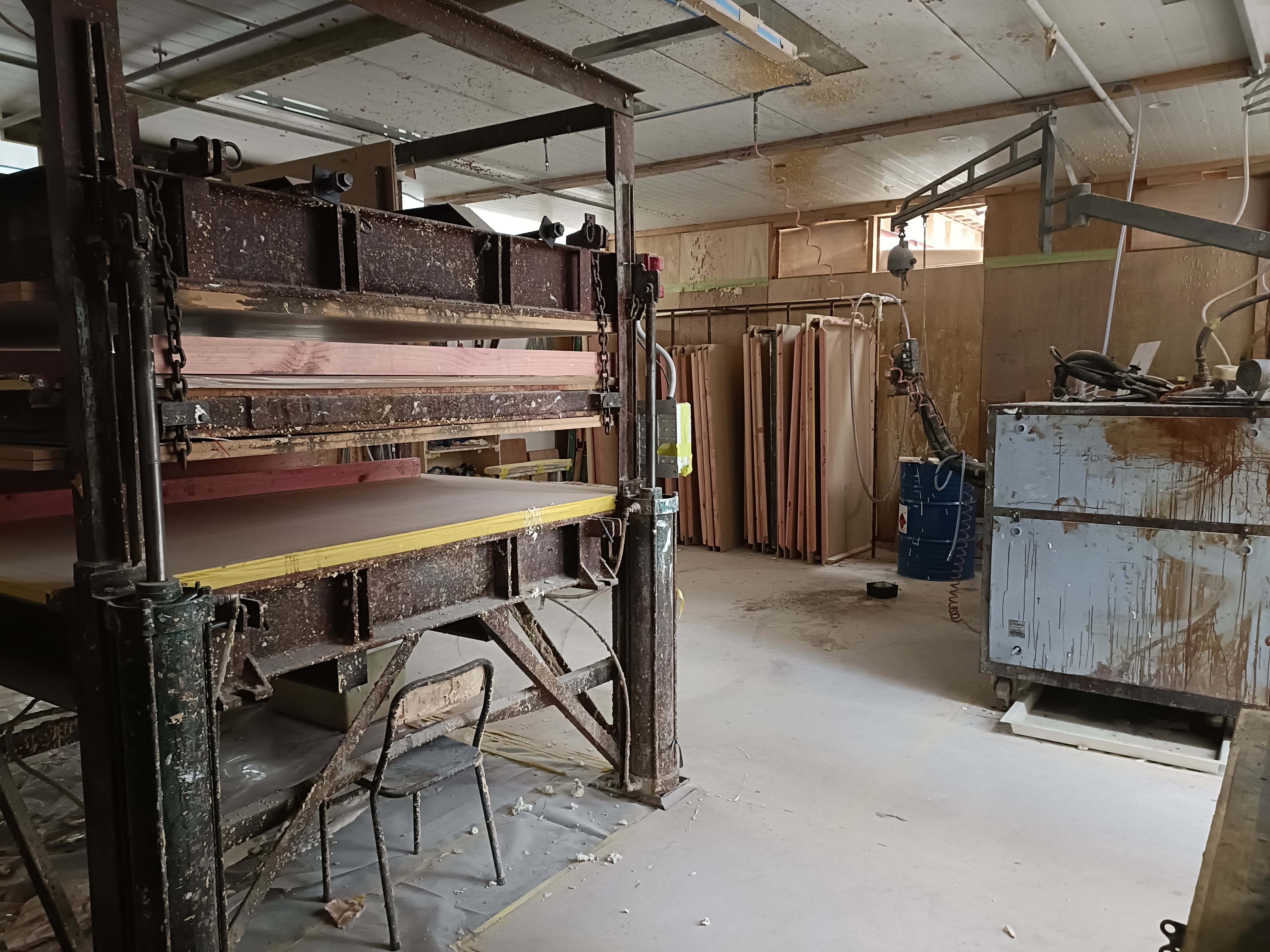Door production area used to inject foam into composite door panels