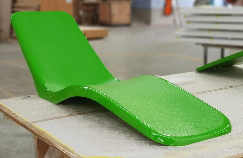 Green fibreglass banana sun lounger in the FDL workshop