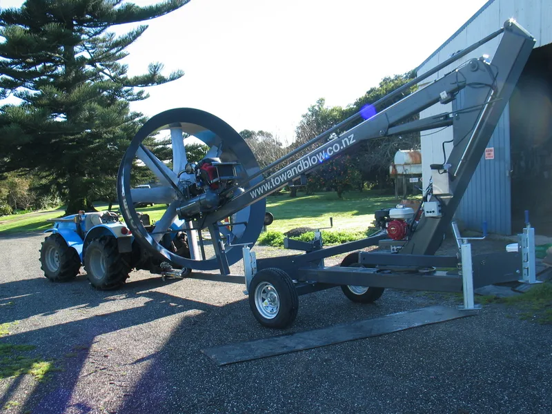 Tow & Blow wind machine being towed behind a tractor