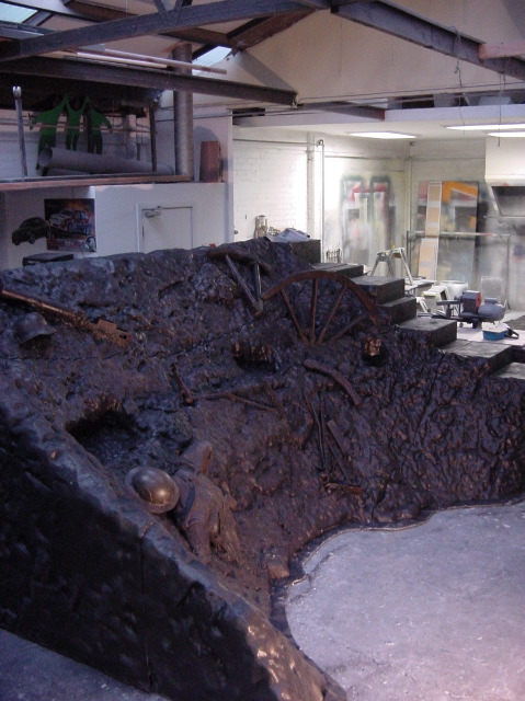 Fibreglass trench exhibit panel with a sculpted battlefield scene in the workshop