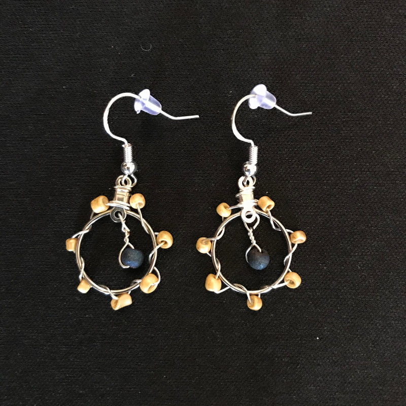 small circle earrings with blue and gold beads