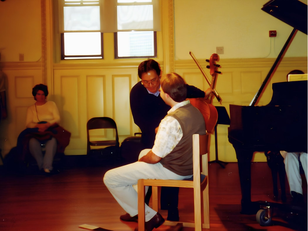 Ro-Ro Ma adn Yo-Yo Ma. Dr. Roman Placzek during a masterclass with Yo-Yo Ma from the time of his studies at The Boston Conservatory.