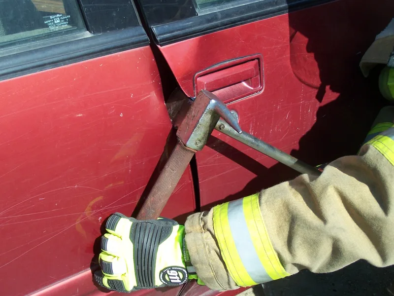Pry Axe pulling down to open door picture