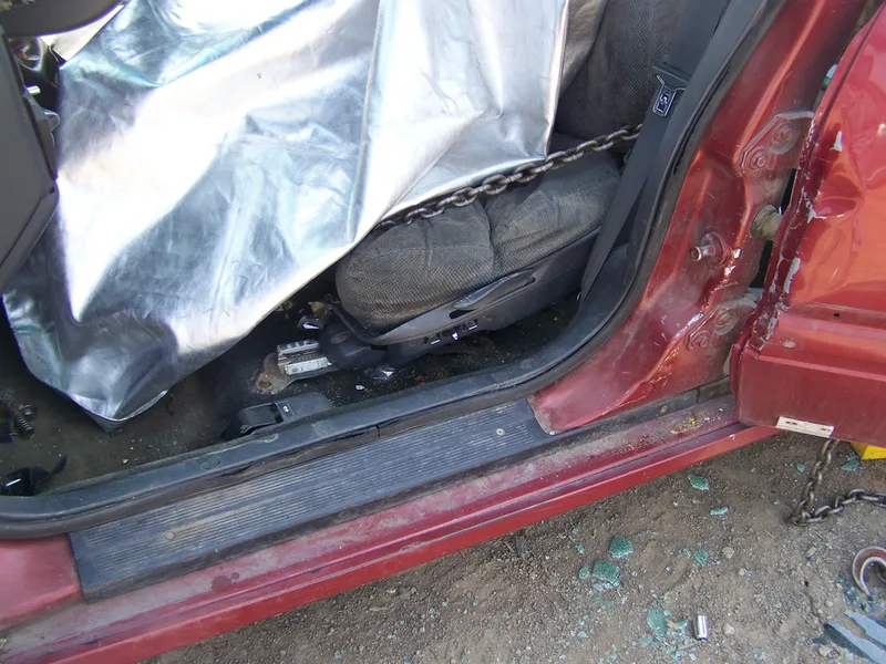 Patient protected by rescue blanket during extrication seat pull