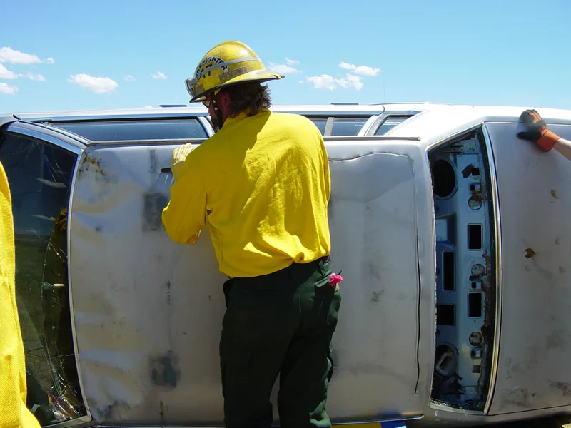 Roof being cut open with Air Gun for patient access in a rollover picture