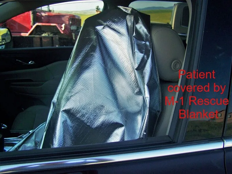 patient covered by the M-1 Rescue Blanket