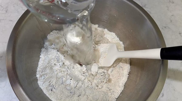 No Knead Dutch Oven Bread Add Water to Flour Mixture