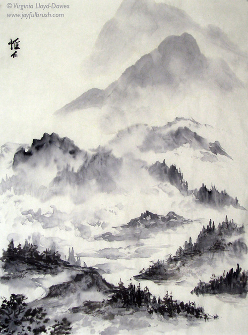 Chinese brush painting of misty mountains on rice paper