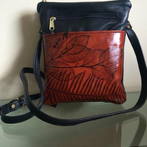 Leaf Leather Savannah Bag with crossbody strap.