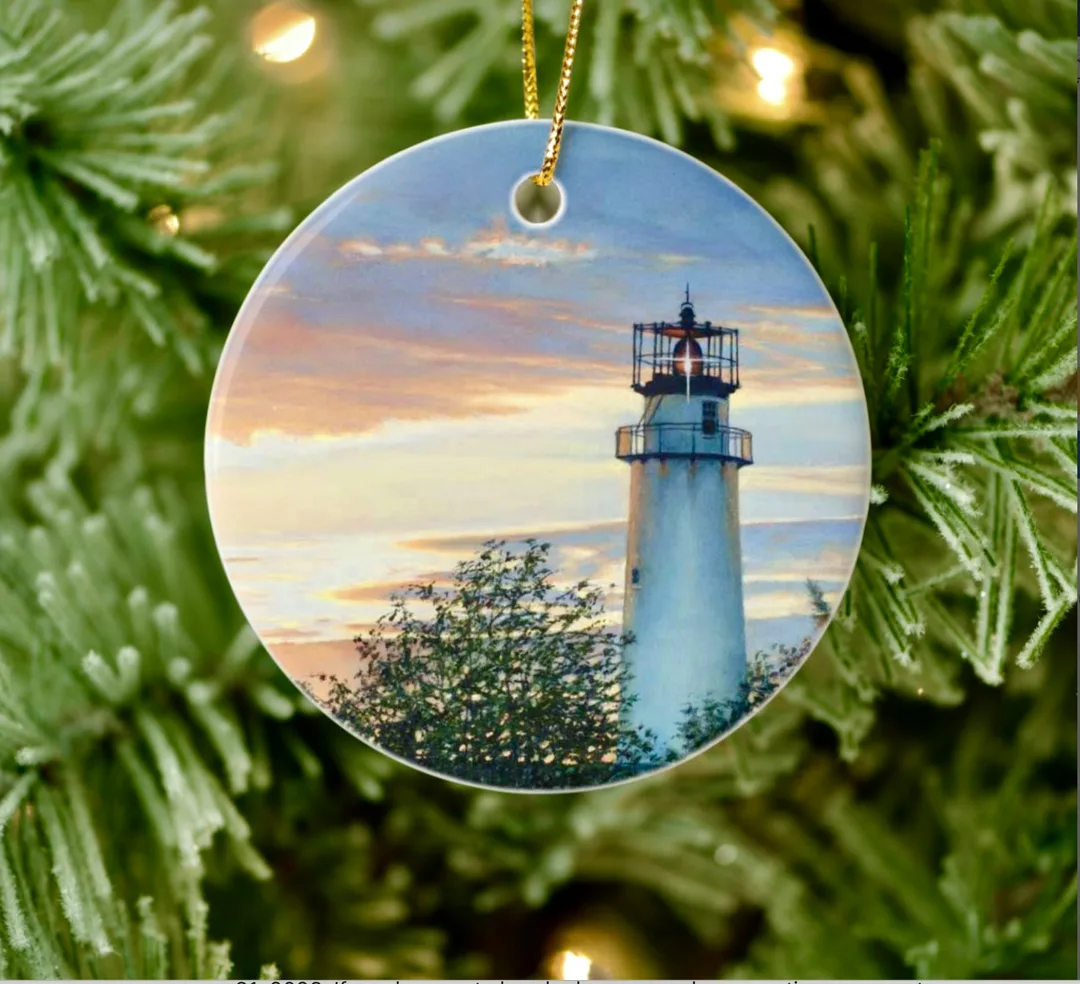 Porcelain ornament featuring an Ellen Rice oil painting of the Fenwick Island Lighthouse.
