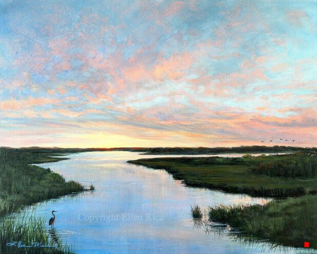 Tidal water winds through back bay marsh while clouds glow in peach and gold in a blue sky as a great blue heron watches in this oil painting. 