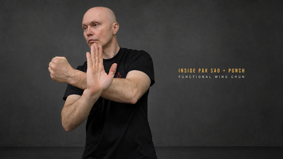 Wing chun teacher doing pak sao and punch at J's gym shinmaruko